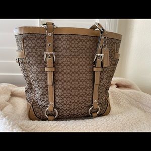 Coach light Brown satchel with leather trim in very good condition.